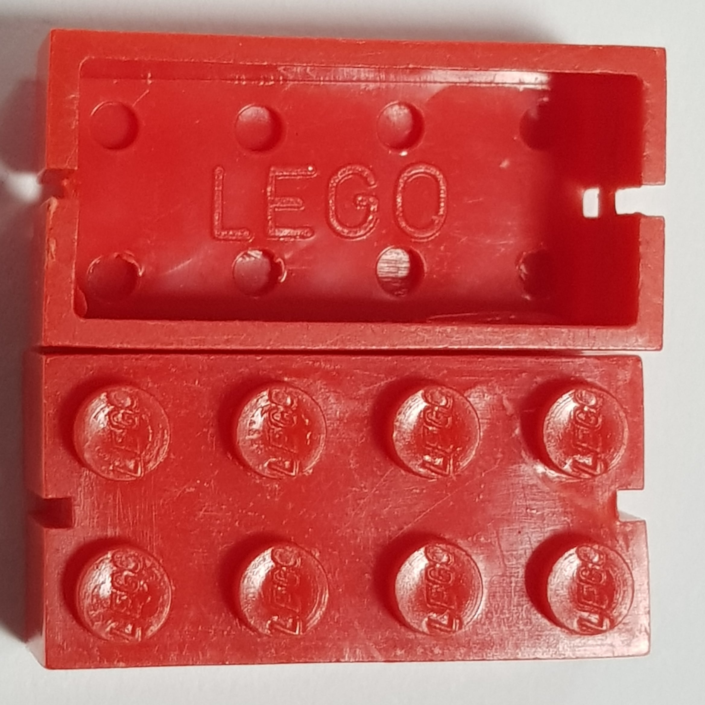 Red double logo Norwegian slotted LEGO brick