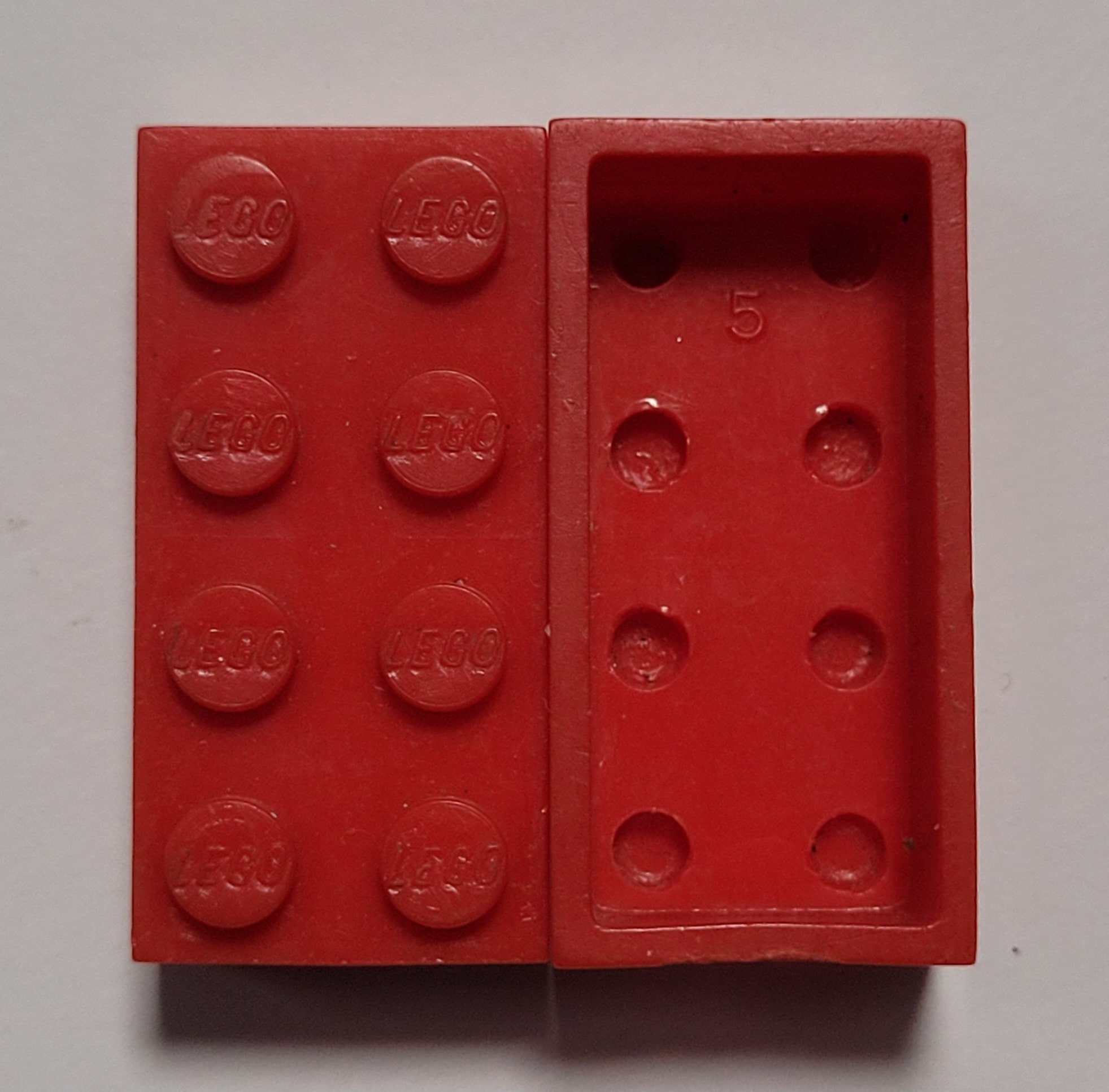 Red hollow LEGO brick