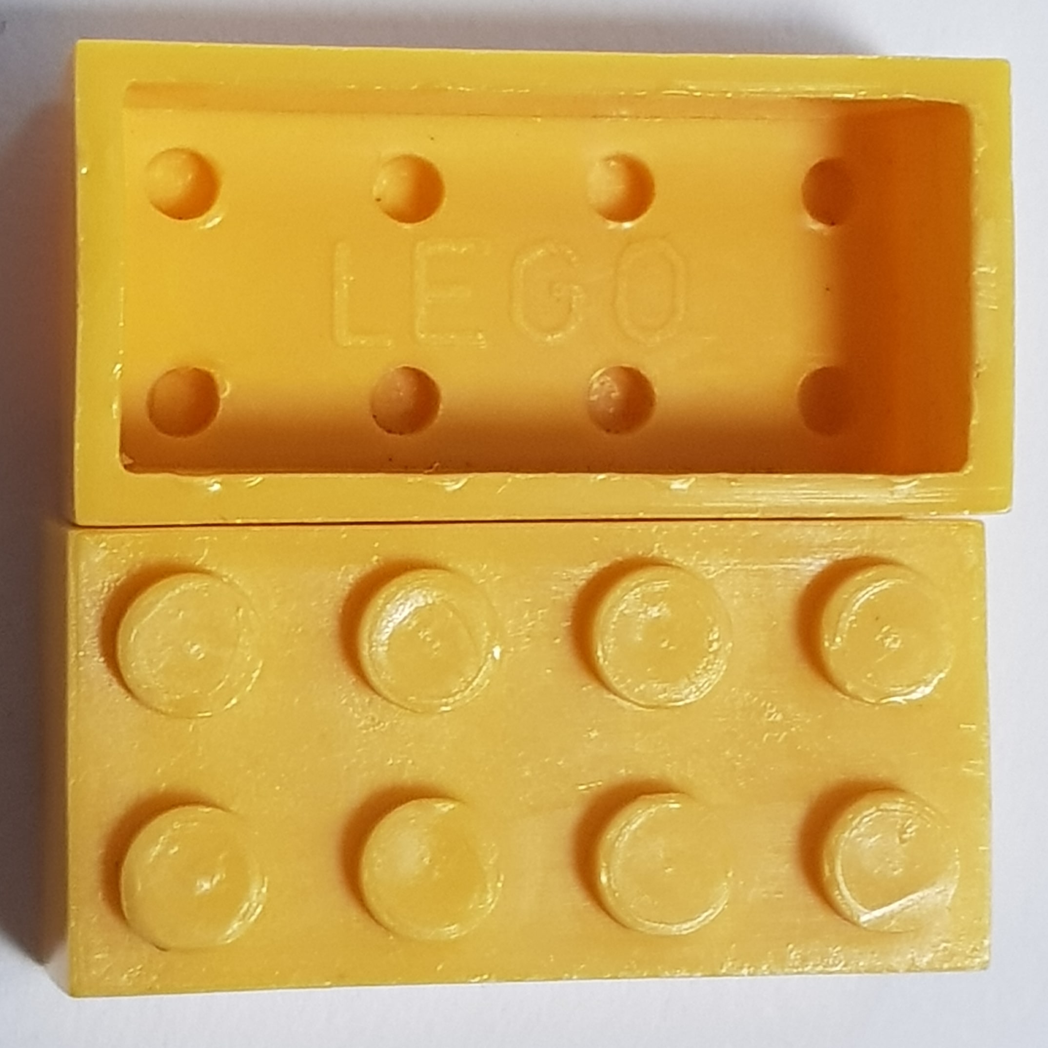 Yellow hollow single logo Norwegian LEGO brick